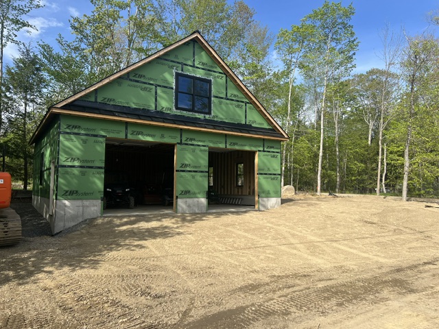 Front exterior of two-bay garage
