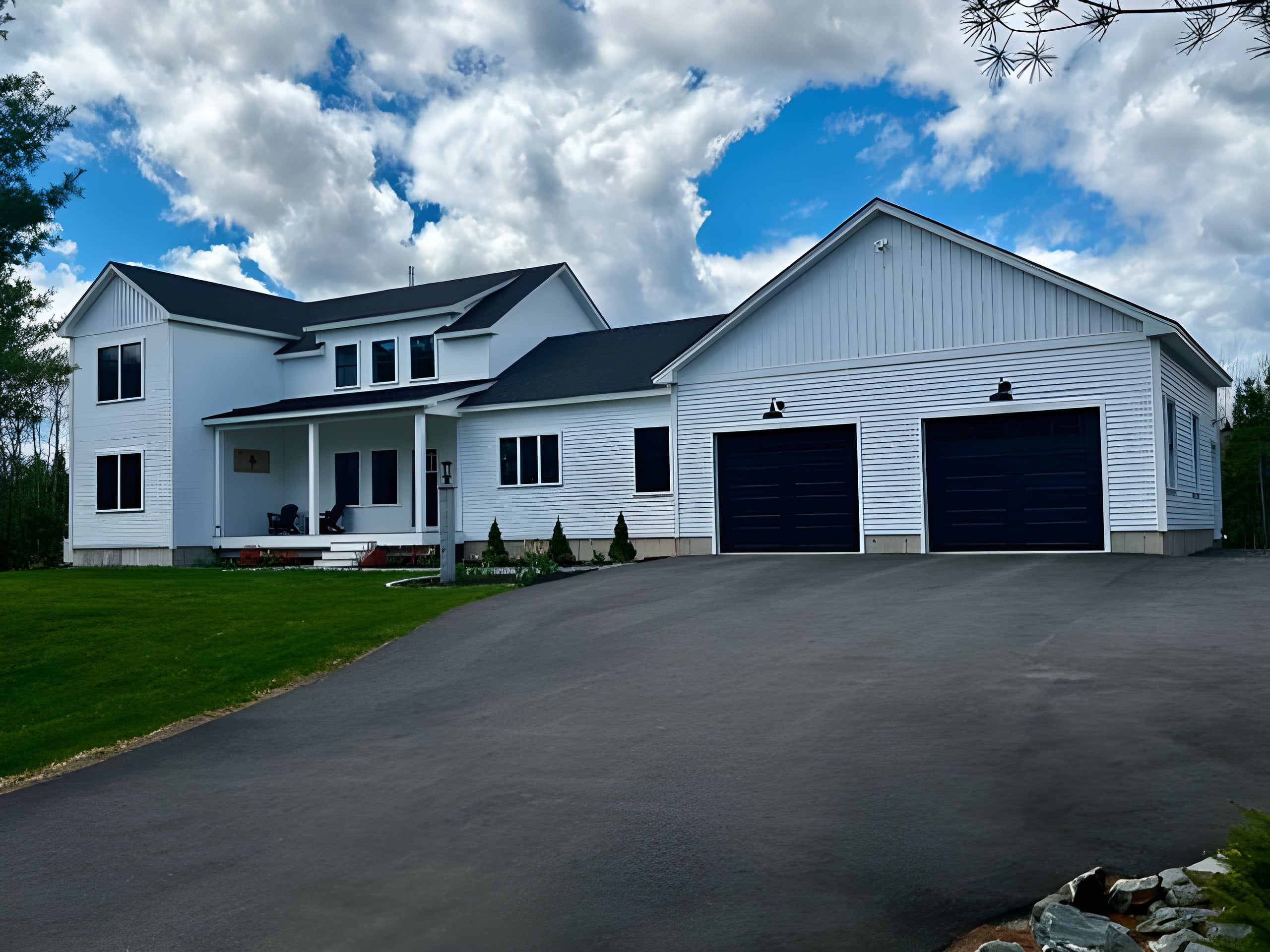 Completed turnkey custom home exterior at sunset